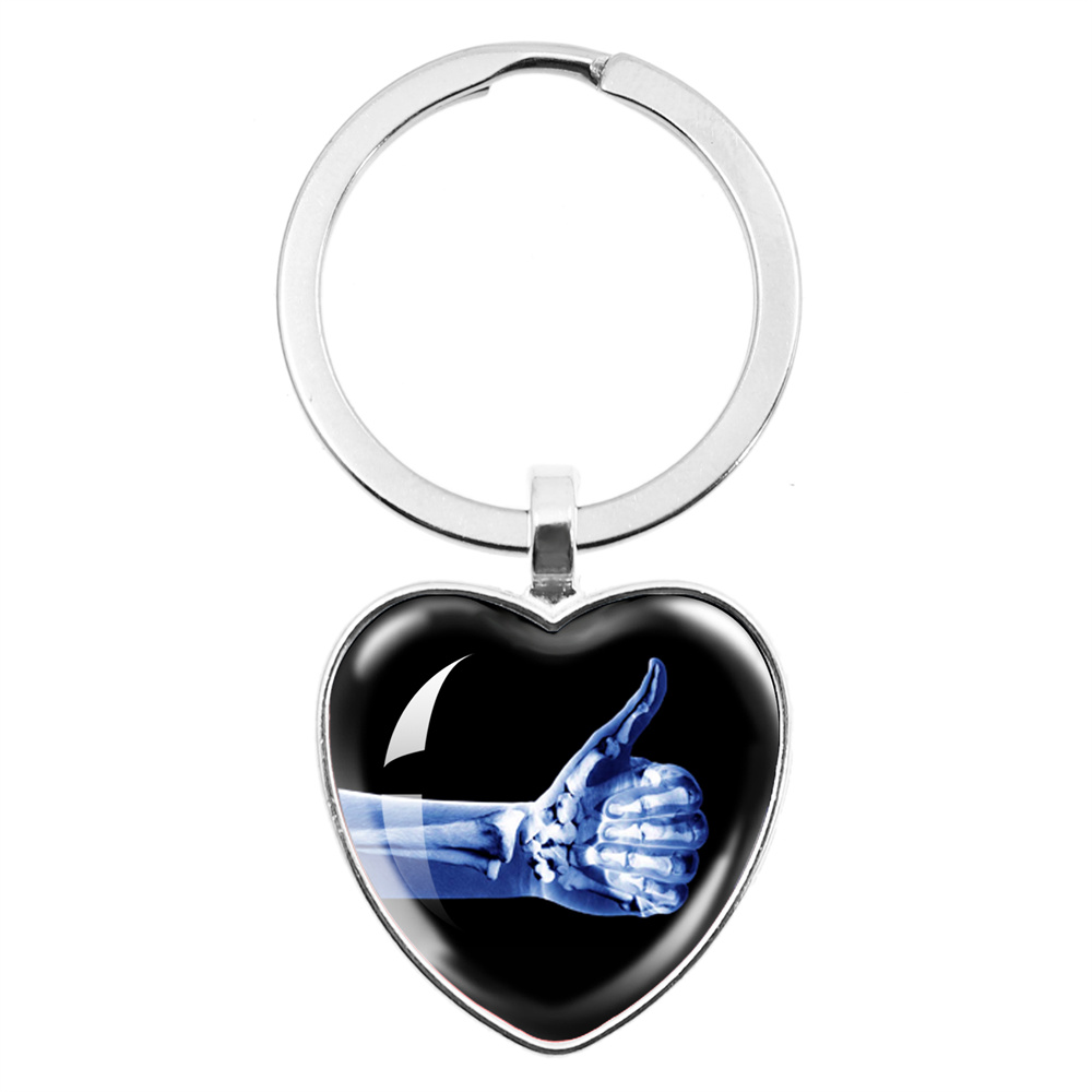X-ray Film Peach Heart Keychai - Xbody Health & Wellness Functional Integrative Medicine Office & Medical Spa Reviews avis et prix